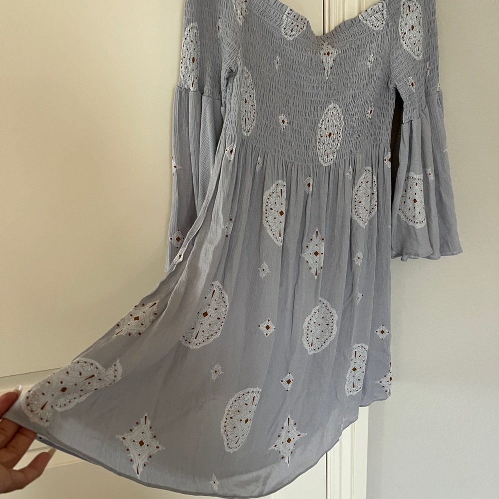 Vici dolls …. off the shoulder light grayish colored print dress . Size Small